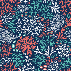 Coral reefs seamless pattern. Underwater colorful plant on navy blue background. Vector illustration © olgdesigner