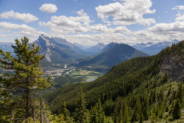 View of the town of Banff from the top of the mountain.  Hiking, climbing, Tourism Alberta Canada. Canadian Rocky Mountains