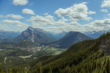 View of the town of Banff from the top of the mountain.  Hiking, climbing, Tourism Alberta Canada. Canadian Rocky Mountains