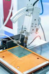 soldering iron tips of robotic system for printed and assembly electric circuit board ( PCB ) at factory