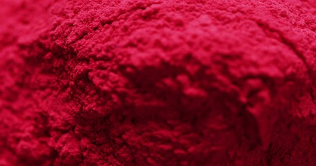 Video of close up of red powder with copy space