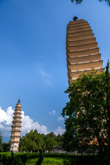 Dali old town Yunnan China, Three Pagodas of Chong Sheng Temple, two pagodas visible, blue sky with copy space for text