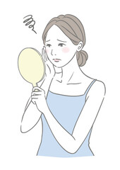 お肌のトラブルに困惑する女性 手鏡を見る女性