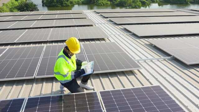 Professional engineer work to maintenance of photovoltaic panel system
