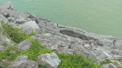 A green cliff overlooking the sea, in Vietnam