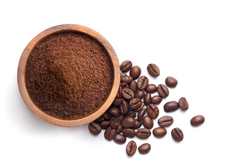 Flat lay of ground coffee with coffee beans isolated on white background.