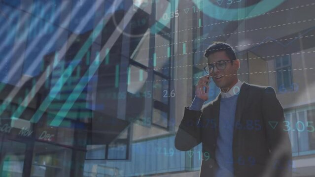 Animation of biracial businessman talking on smartphone over data processing and stock market