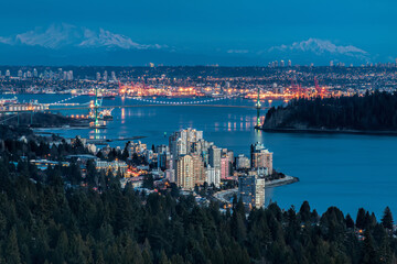 Vancouver Skyline looking towards Burnaby and east with Mt. Baker and The Twins in the background