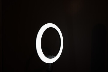 LED ring light with a dark background	
