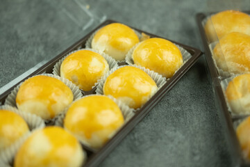 Chinese pastry or moon cake in plastic packaging. Close up