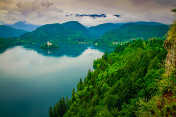 Fototapeta na wymiar Lake Bled and Santa Maria Church from above, idyllic landscape of Slovenia
