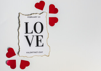 Paper art with detail word February 14 love Valentine's day with framing red paper  shaped  love  isolated on white background