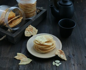 crunchy almond biscuits on a white plate