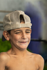 male child in swimsuit with cap thinking meme
