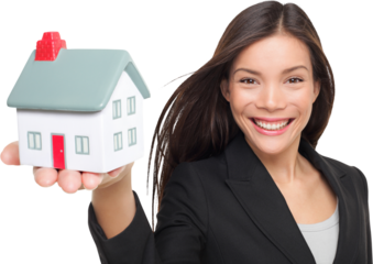 Real estate agent selling home holding mini house. Female realtor in business suit smiling happy showing model house isolated in transparent PNG. Multiracial Caucasian / Chinese Asian woman agent.