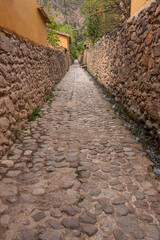 Cobblestone and narrow streets in an Inca town in Peru