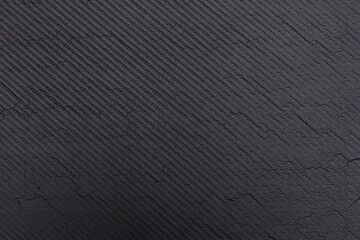 Carbon pattern surface cracks due to service life.