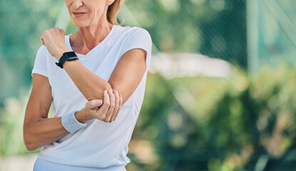 Fitness, arm pain and tennis training with a mature woman on a outdoor court with mockup and...