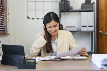 Work of secretary concept, Female secretary thoughtful while reading data on business document