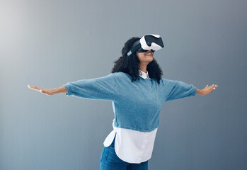 Woman, virtual reality glasses and metaverse with mockup space and hands for 3d flying game in...
