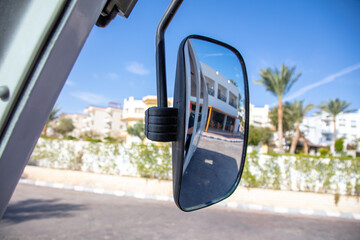 Mirror on the bus in the tropics