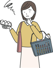 食品の値上がりに困っている買い物中の女性