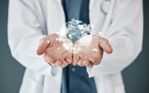 Doctor, hands and 3D hologram of world for global healthcare, digital help or life insurance against a studio background. Hand of medical expert with futuristic globe for networking or innovation