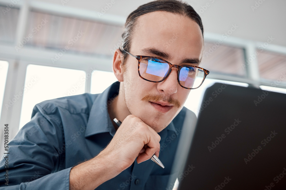 Poster Serious man, internet and laptop in office for email, typing and creative, design and idea in business. Website, search and seo guy with glasses busy on online project, task and problem solving in IT