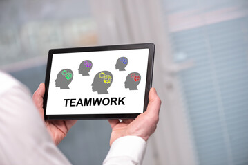 Teamwork concept on a tablet