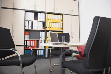 Empty modern office desk laptop computer