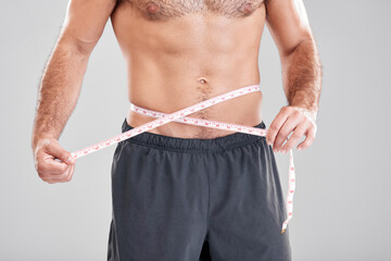 Fitness, weightloss and man with measuring tape on waist, healthy diet and exercise in body care....