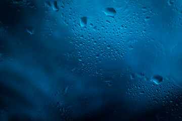 Drops of rain on glass