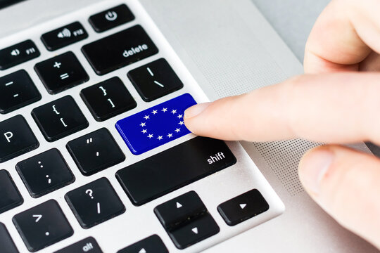 European Union and EU community CE marking concept with sign, symbol and EU flag on a computer key