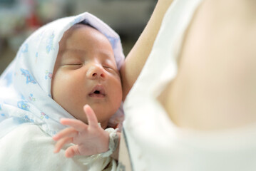 Fototapeta na wymiar sleeping newborn baby boy asian