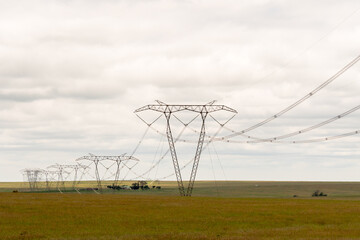 power lines in the field running through agricultural farm land in rural South Africa concept...