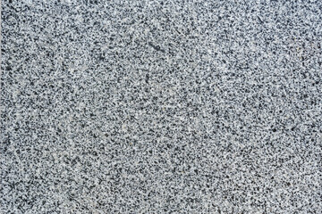 Close up seamless texture of gray granite background.