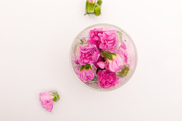 Fototapeta na wymiar Carnations in a glass