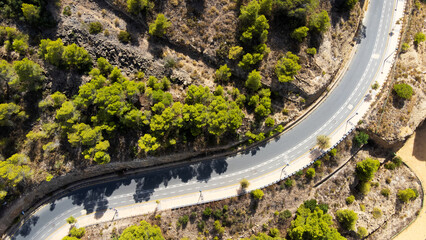 travel and transportation concept - aerial view of mountain road