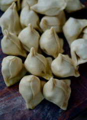 Uncooked delicious street food called Singara locally, popular breakfast item made with wheat and potatoes,spicy indian junk food 