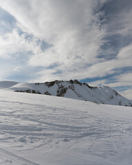 Fototapeta na wymiar White sunny snow mountain landscapes
