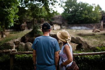 Naklejka na ściany i meble Man with Dementia Standing with Wife at Cincinnati Zoo