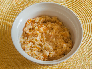 Pumpkin porridge with rice. Flat lay