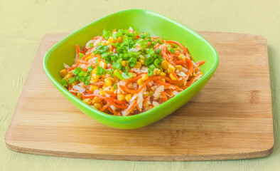 Spicy salad on the kitchen table.