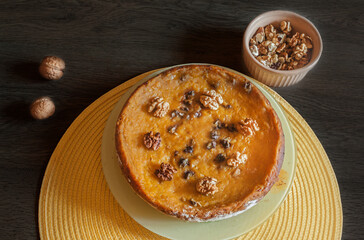 Pumpkin pie with nuts. View from above.