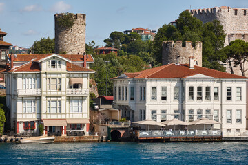Fototapeta na wymiar Picturesque wooden waterfront houses in the Bosphorus strait. Istanbul. Turkey