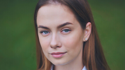 Portrait of an 18-year-old girl. Close-up of her face.