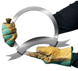 Hands with protective work gloves holding a round metal icon or symbol with empty metallic ribbon with copy space and isolated on white or transparent background, png.