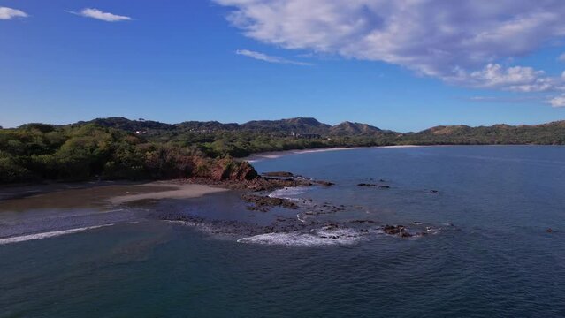 This is Playa Conchal, with a white sandy beach full of shells and crystal clear waters.