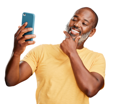 A contemplative trendy mature african american man taking a selfie on a smart phone isolated on a png background. Fashionable black man standing and posing while taking pictures for social media