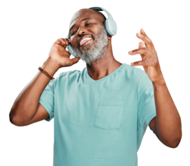 A joyous mature African American man wearing headphones and deeply involved in to the music. Smiling black man feeling free while expressing through dance isolated on a png background.
